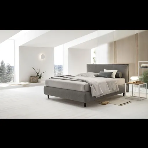 Letto in tessuto imbottito con testiera e box contenitore Dalia di V&Nice